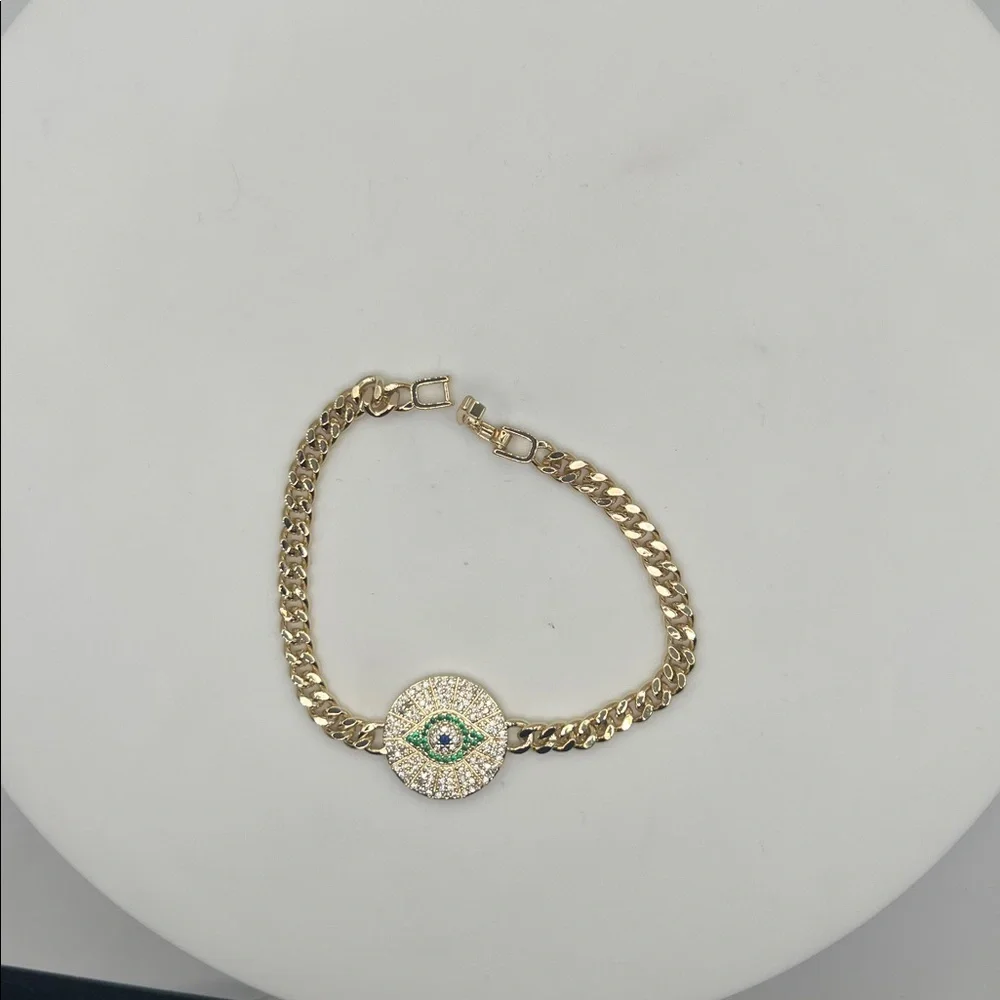 045. 18k Gold Plated Evil Eye Bracelet with green accents 7 1/4”